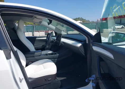 2023 Tesla Model Y Awd/Long Range Dual Motor All-Wheel Drive from USA, damaged, VIN 7SAYGAEE9PF590190